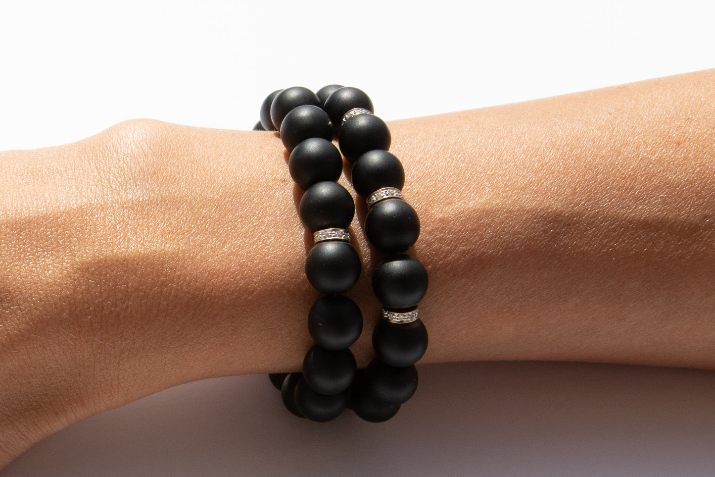 Set of Two Black Onyx Beaded Bracelet With Pavé Diamonds Set in 14k Yellow Gold Pictured on Arm