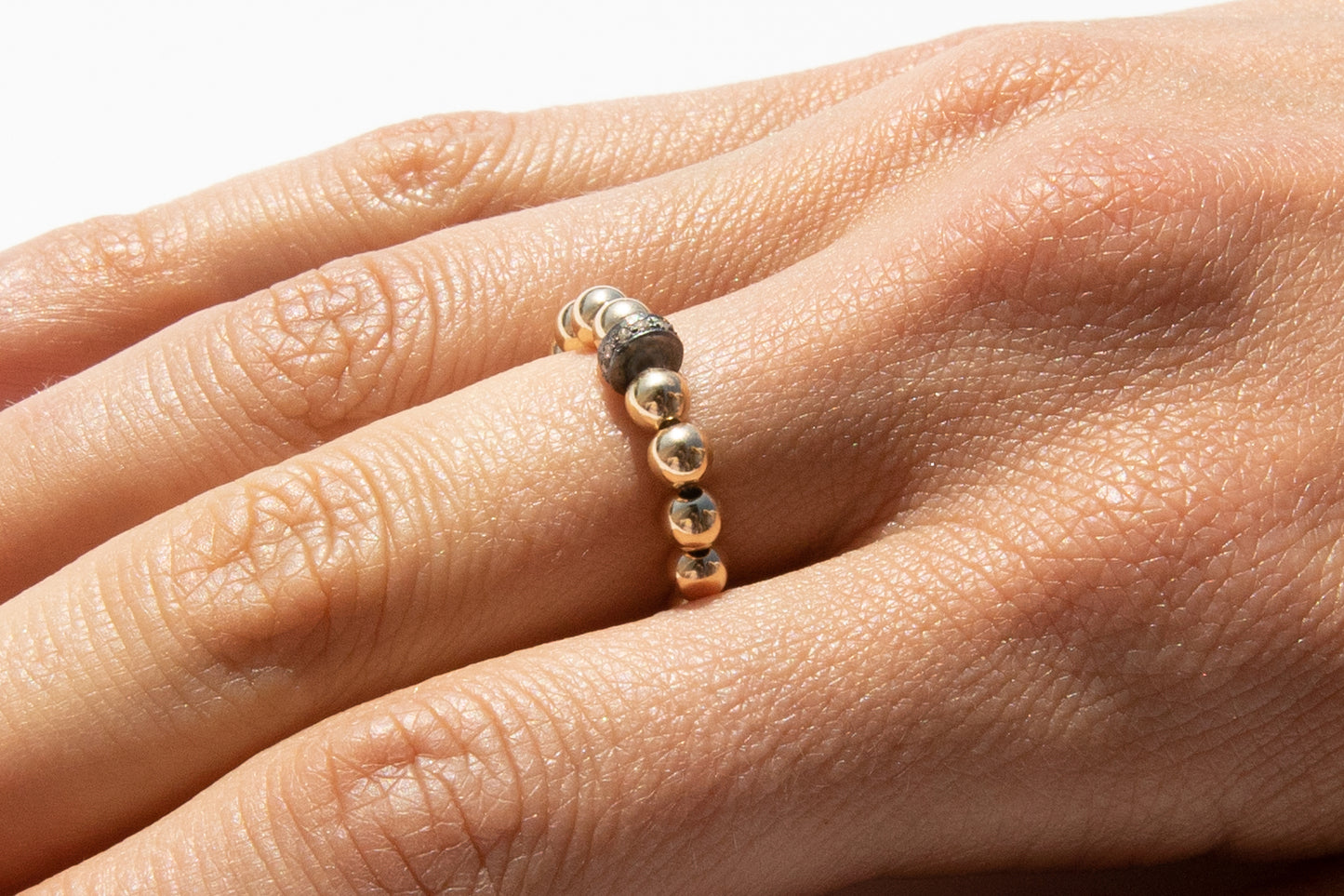 Gold Ring + Pavé Diamonds in Oxidized Silver
