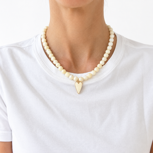 Faceted Mother of Pearl Beaded Necklace with Heart Drop